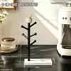 Suporte de armazenamento de copos com homem vesgo em desenho animado, suporte para copos de água em formato de árvore, suporte para xícaras de café e chá de mesa, suporte criativo para pendurar