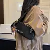 Bolso de hombro cruzado tipo baguette retro casual de moda diario de nicho, nuevo para otoño 2026, estilo coreano, moderno y simple