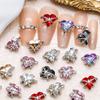 Novo estilo coração de pêssego torto Diamante xiemun xingmang Unha de celebridade da internet Joia de liga para unhas Cristal quente Acessórios de metal com diamante para unhas
