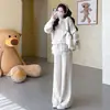 Conjunto de moda gestante outono e inverno 2026 novo estilo, conjunto de duas peças com top e calça, conjunto de outono moderno para mães estilosas durante a gravidez