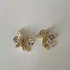 Pendientes de circonita con textura de viento frío y flores, nicho femenino, personalidad única, temperamento de moda, pendientes que combinan con todo.