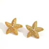 Pendientes de acero inoxidable con forma de estrella de mar, estilo popular de internet, para mujer, temperamentales, versátiles, con circonita de punto y titanio, elementos marinos