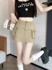 Falda de mujer caqui chica hot cintura alta adelgazante cadera falda Otoño 2023 Nuevo estilo americano falda ins