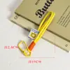 Llavero de cuerda para mochila, mosquetón tejido de nailon, cordón para bolsa, colgante de muñeca colorido, adorno de estrella, cuerda doble
