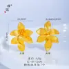 Collar con Colgante de Llave Flor de Lirio Chapado en Oro de Lujo para Mujer con Diseño de Ginkgo y Dios Amarillo de la Riqueza, Mismo Estilo que la Tienda de Oro Puzuo
