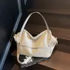 Bolsa Feminina Vintage para Exportação 2026 Novo Modelo Grande Capacidade Moda Bolsa de Ombro Transversal Elegante Cor Sólida Bolsa de Mão Feminina