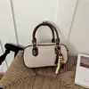 Bolso cuadrado pequeño de estilo coreano para mujer, perfecto para el uso diario, un bolso cruzado o de hombro moderno
