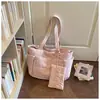 Bolsa de algodón de color liso, simple y elegante, bolso de mano de moda, bolso tote de un solo hombro, para llevar debajo del brazo, nueva versión coreana, primavera 2026