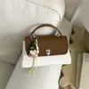 Bolsa Versátil Transfronteiriça 2026 para o Dia a Dia Estilo Coreano Nicho Retro Color-Block Bolsa de Mão Moda Feminina Bolsa de Ombro Transversal