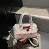 Bolsa de Axila Doce com Laço para Mulheres 2025 Verão Nova Tendência Moda Bolsa de Lona com Bolinhas Bolsa de Ombro de Nicho