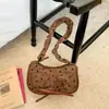 Bolsa Nova em Formato de Lua Fresca e Estilosa, Moda Verão 2026, Bolsa Transversal Casual Tendência Única Estilo Chinês para Mulheres