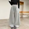Pantalones de chándal para niña Primavera y Otoño 2026 Nuevos Casual Niña Estilo Coreano Niños Medianos y Grandes Remache Sueltos Tejidos Deportivos Modernos