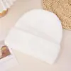 Sombrero de lana de ocio de pelo de conejo de otoño e invierno europeo y americano para hombre y mujer, cálido, con orejeras, sombrero para el frío, sombrero de esquí de color liso de moda, versátil