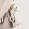 Bolsa para botella de agua magnética de fitness más vendida transfronteriza, bolsa cruzada para taza de agua, bolsa para guardar teléfono y llaves de fitness, directo de fábrica