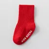 Bebés recién nacidos niños y niñas bebé bebé niños pequeños algodón peinado primavera y otoño invierno año nuevo calcetines rojos bolsa transparente venta al por mayor