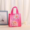 Bolsa de regalo portátil no tejida transfronteriza Fiesta de temporada bolsa de regalo de dulces bolso de mano no tejido al por mayor