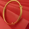 Joyería Sand Gold, Anillo Sencillo de Herencia Antigua, Pulsera de Empuje y Tirón para Mujer, Oro Simulado, Lujo Accesible, Joyería de Tres Oros para Bodas de Alta Gama