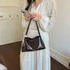 Bolso de Mano Retro de Nicho Estilo Coreano Bolso Baguette para Mujer 2026 Primavera y Verano Nueva Moda Textura de Alta Gama Bolso de Hombro para Debajo del Brazo