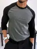Hombre musculoso estilo americano, colorblock otoño e invierno, capa base casual de manga larga para deportes y fitness, estilo minimalista