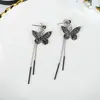 Corea del Sur pendientes largos elegantes súper Hada Mariposa borla mujer Mismo estilo de网红