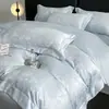 Juego de cuatro piezas de Tencel lavado jacquard de verano con lazo, seda helada, funda nórdica sedosa y suave, juego de ropa de cama de tres piezas de alta gama