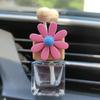 Perfume para coche de girasol transfronterizo, botella pequeña de margarita para salida de aire acondicionado del coche, botella vacía, accesorios para coche