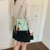 2026 Nuevo Estilo Bolso Cubo de Cadena con Rejilla de Diamantes Negros Bolso Pequeño de Hombro Cruzado Estilo Fragancia para Mujer Versátil para Viajes