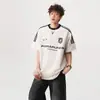Camiseta Unissex de Manga Curta com Gola Redonda Solta Estilo High Street Americano Verão 2025 para Adolescentes Camiseta Esportiva de Peso Pesado