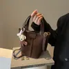 Bolso de mano retro de gamuza, nueva colección otoño/invierno 2026 para mujer, bolso de hombro mate a la moda, bolso cruzado para el trabajo