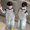 Camiseta de manga larga 100% algodón para niño, colección primavera y otoño 2026, estilo nuevo para niños mayores, camiseta base raglán para bebé, moderna