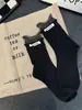 Calcetines Ancora Red de Productos Europeos de Lujo Ligero de Moda Nuevo Estilo Coreano Calcetines de Longitud Media a Juego Etiqueta de Tela Letra mm Oreja de Madera Calcetines para Mujer