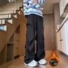 Pantalones de traje de pierna ancha plisados para hombre, otoño estilo americano nicho retro pierna recta holgados con caída casual hasta el suelo ligeramente acampanados
