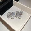 Brincos de arco de diamante estilo coreano de agulha de prata, brincos elegantes e de moda, brincos de design de nicho, leves, luxuosos e sofisticados