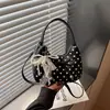 Bolsos de lunares de nicho transfronterizos para mujer, nuevo estilo 2026, moda versátil, bolso cruzado, bolso de mano de alta gama chic, bolso tipo dumpling