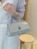 Bolso coreano de nicho, nueva moda verano 2026, bandolera de color sólido texturizado, bolso de mujer elegante de alto valor