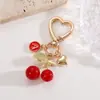 Amazon versión coreana de llavero con letras de cereza colgante accesorios para bolso aleación DIY cerezas colgantes venta al por mayor