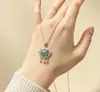 Colgante Auténtico de Jade Grado A Material Peligroso Cerradura Concêntrica Incrustada Colgante de Collar Ruyi Versátil Exquisito Unisex