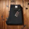Estação Europeia outono e inverno calça de lã stretch masculina escovada espessa quente reta solta business casual sem passar