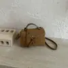 Bolso pequeño cuadrado versátil casual retro mate 2026 para mujer, bolso de hombro de moda estilo coreano, sensación de alta gama nicho primavera 2025