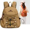 Mochila pequeña impermeable ligera estilo japonés para comercio exterior transfronterizo, deportes, modelo nuevo 2026, mochila para mujer para viajes al aire libre y ocio