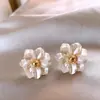 Nuevos Pendientes de Concha de Flor Aguja de Plata 925 Camelia Exquisito Diseño Moderno Estilo de Alta Gama Pendientes de Textura