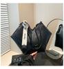 Sentido del diseño nicho cinta gran capacidad bolsa de viaje bolso tote 2025 nueva moda combinable simple bolso de hombro