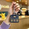 Mini bolso colgante para el hogar, bolso pequeño, bonito bolso, nuevo, a la moda, con colgante, boca, sobre rojo, bolso para auriculares, llave de coche