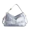 Bolsa Saco Texturizada Nova Primavera 2026, Fashion e Tendência, Bolsa de Mão Casual Única, Bolsa de Ombro e Transversal Feminina