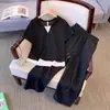 Traje Deportivo Casual de Verano para Mujer 2026 Nuevo Elegante y Moderno Estilo Coreano Conjunto de Pantalones Anchos de Manga Corta Falso de Dos Piezas