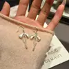 ShilijianO Laço é Muito EleganteBranco Doce e Fresco Brincos de Argola com Pingente de Laço Versátil para Meninas