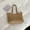A bolsa de ombro feminina popular de alta costura deste ano 2026 nova versátil de grande capacidade bolsa de mão bolsa tote estilosa para mulheres