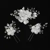 Acessórios de cabelo de noiva mais vendidos transfronteiriços, tiara de flor de pérola, pente de cabelo feito à mão, conjunto de grampos e palitos de cabelo para fotografia de viagem de casamento