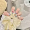 Estampado de Leopardo Artístico con Lazo de Pedrería Corazón de Gato Lindos Adhesivos para Uñas Portátiles Hechos a Mano Venta al por Mayor