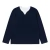 Camiseta suelta de manga larga de dos piezas falsas para hombre, primavera y otoño, marca de moda INS, con bloques de color, cuello redondo, top casual texturizado